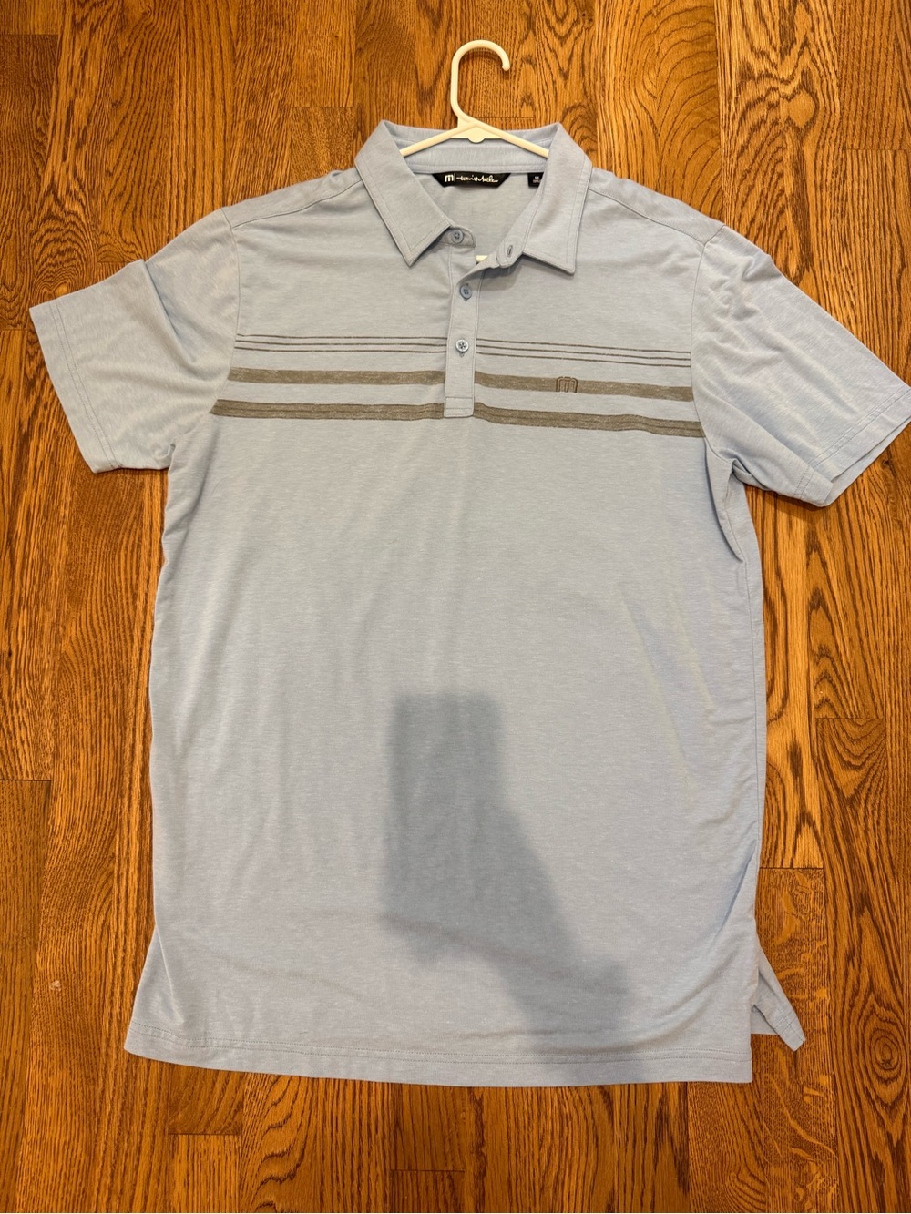 Travis Mathew Light Blue Polo with Gray Stripe Detail